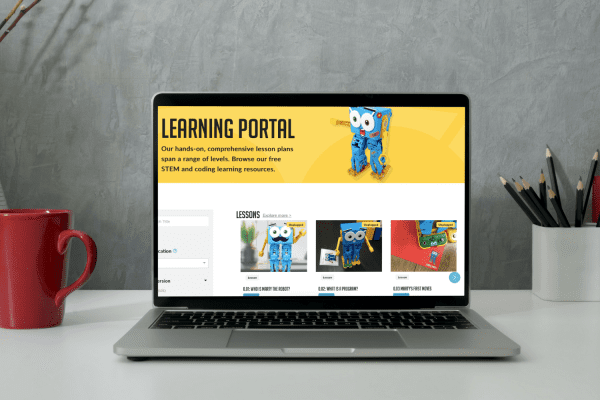 Open laptop with screen displaying Robotical's learning portal